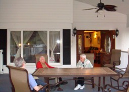 Ray sitting with my husband and another resident